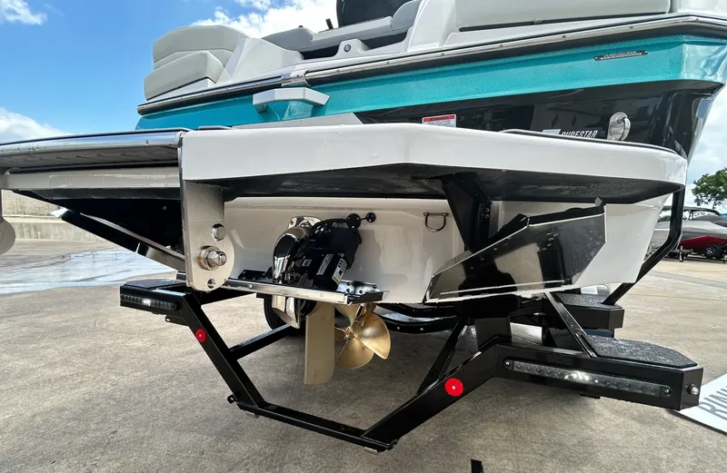 Slide: The Image of Rear view of 2026 MasterCraft XT22 showing propeller and hull details. - 15