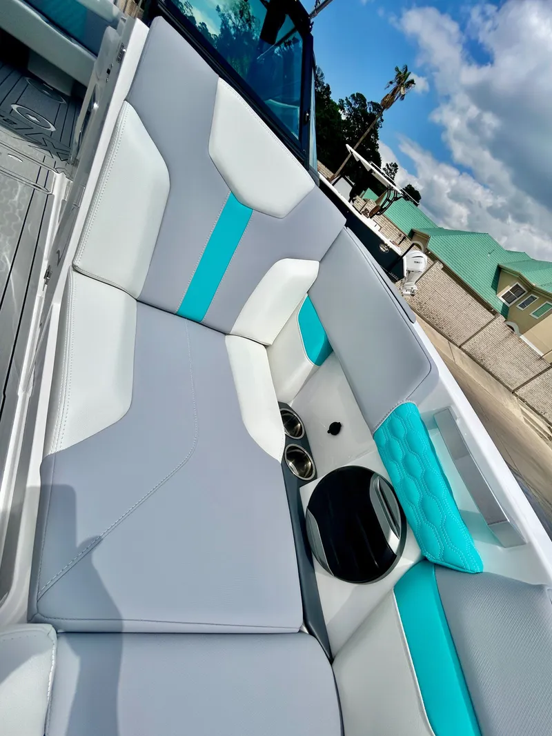 Slide: The Image of Interior of 2026 MasterCraft XT22 with modern seating. - 22