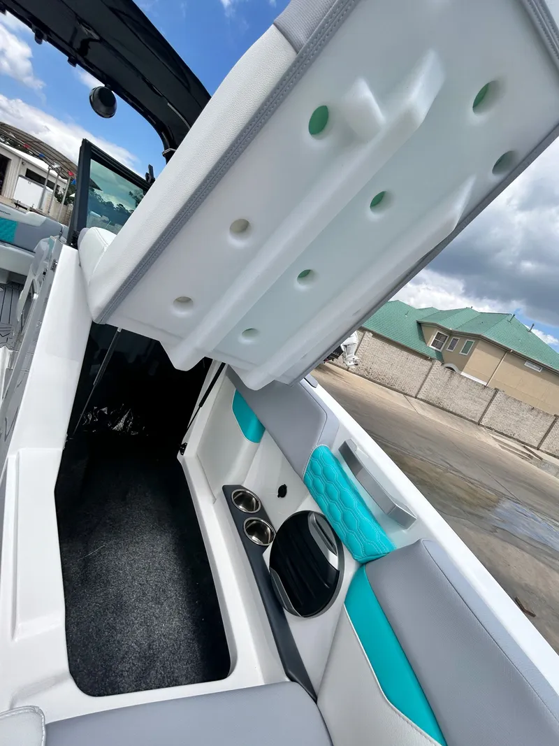 Slide: The Image of Interior of 2026 MasterCraft XT22 with seating and storage. - 24