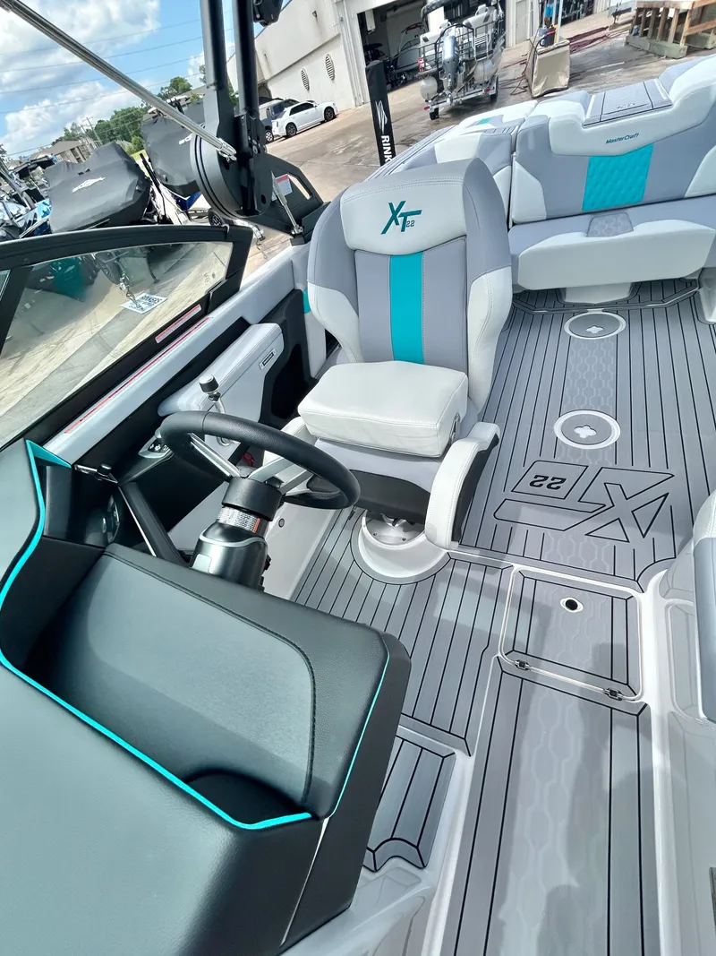 Slide: The Image of Interior of 2026 MasterCraft XT22 boat with modern seating. - 27