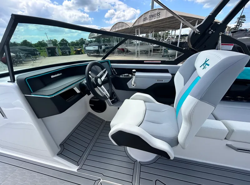 Slide: The Image of Interior of a 2026 MasterCraft XT22 boat with modern design. - 28