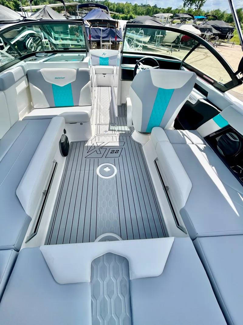 Slide: The Image of Interior of 2026 MasterCraft XT22 boat with modern seating. - 31