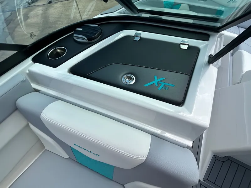 Slide: The Image of Interior of 2026 MasterCraft XT22 with storage and upholstery. - 33