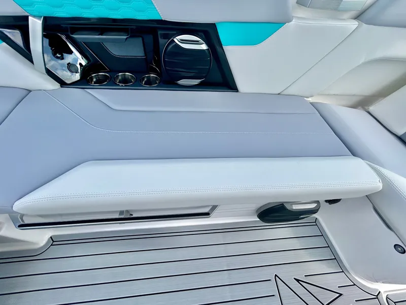 Slide: The Image of Interior of 2026 MasterCraft XT22 with modern seating and cup holders. - 38