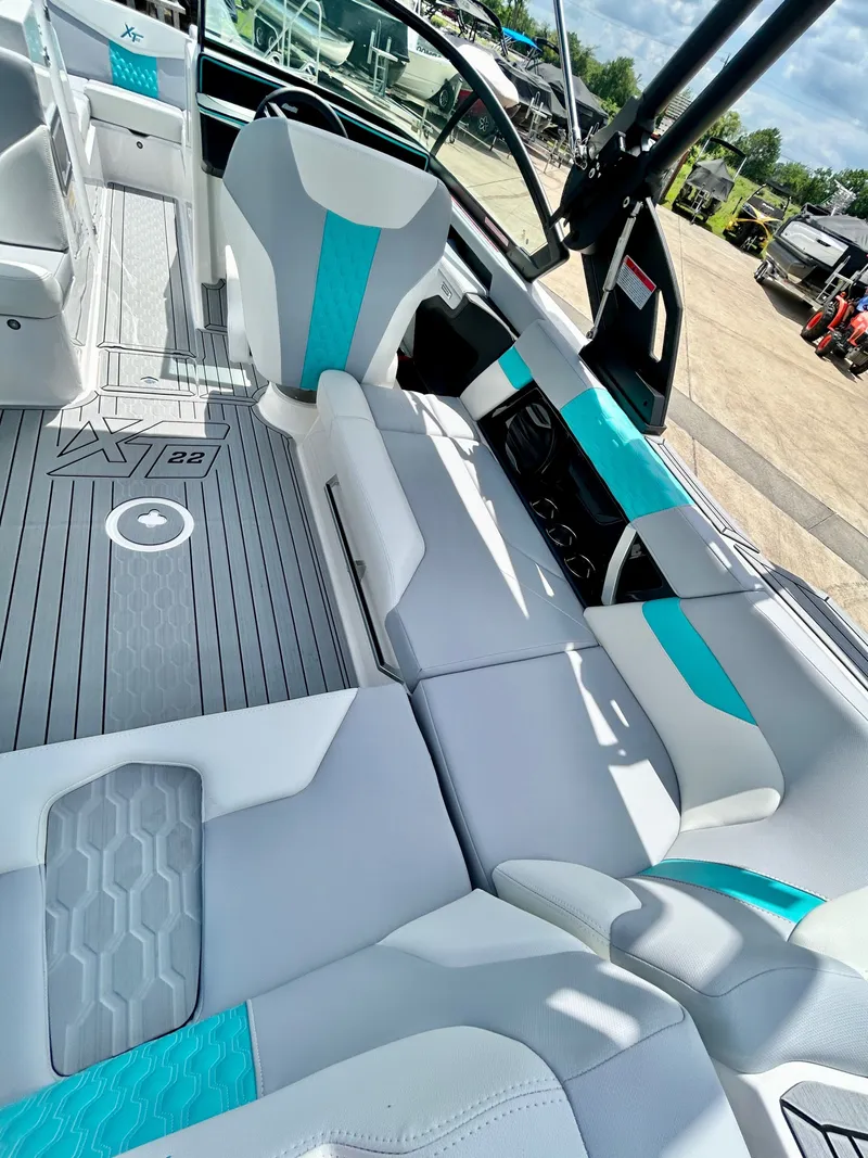 Slide: The Image of 2026 MasterCraft XT22 interior with modern seating. - 42