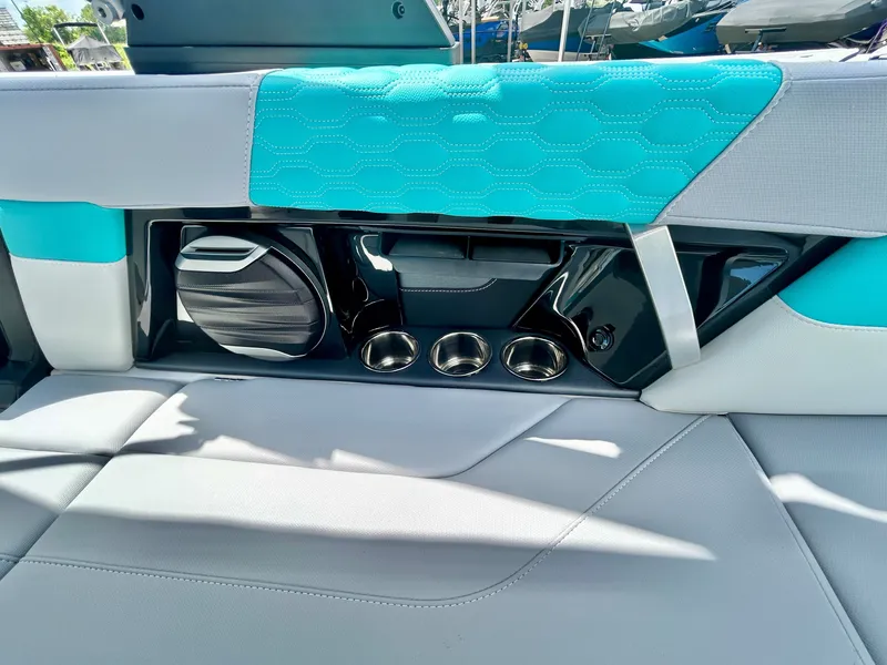 Slide: The Image of Interior of 2026 MasterCraft XT22 with speaker and cup holders. - 45