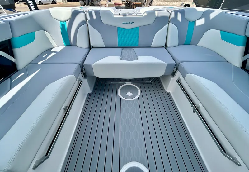 Slide: The Image of Interior of 2026 MasterCraft XT22 with gray and blue upholstery. - 47