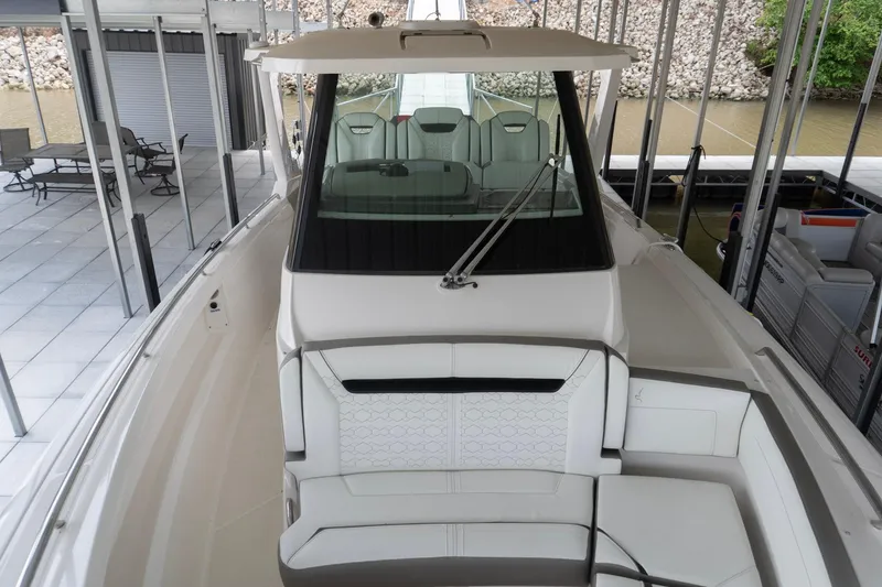 Slide: The Image of 2026 Tiara Yachts 34 LS luxury boat with sleek design and spacious seating. - 21
