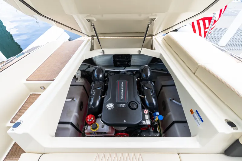 Slide: The Image of Engine compartment of 2025 Chris-Craft Sportster 25, showcasing Volvo Penta engine. - 14