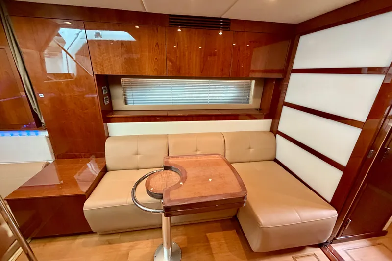 Slide: The Image of Luxurious interior of 2012 Sea Ray 450 Sundancer yacht with elegant wood finishes. - 28