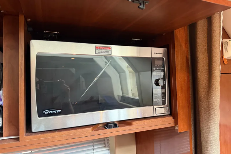 Slide: The Image of Panasonic inverter microwave in 2012 Sea Ray 450 Sundancer yacht kitchen cabinet. - 31