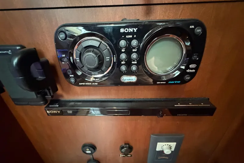 Slide: The Image of Sony marine audio system on 2012 Sea Ray 450 Sundancer yacht dashboard. - 44