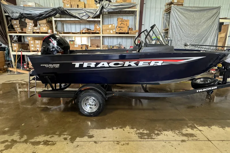 The Image of 2026 Tracker Pro Guide V-175 WT boat in a warehouse setting. - 0