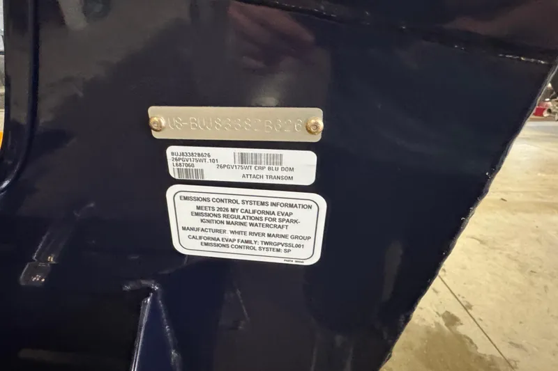 Slide: The Image of 2026 Tracker Pro Guide V-175 WT emissions control label on boat transom. - 4
