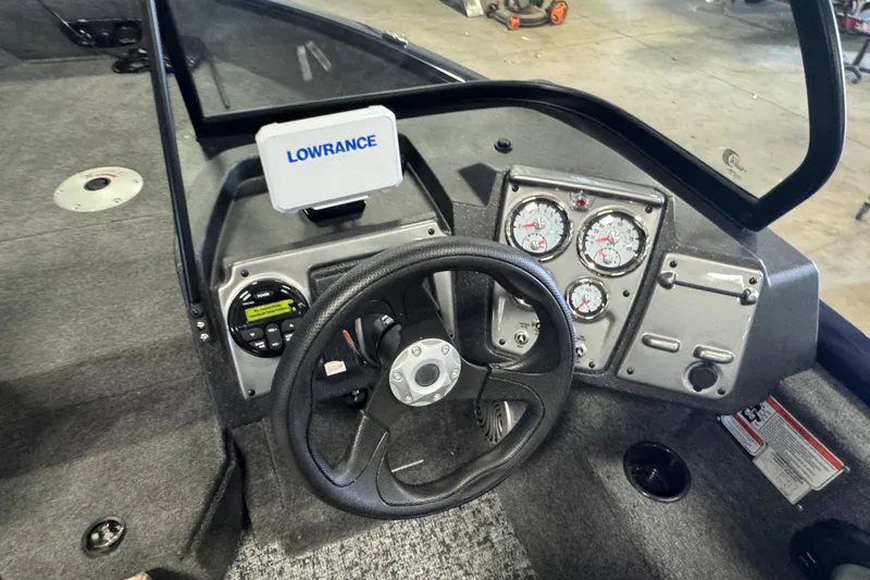 Slide: The Image of Dashboard of 2026 Tracker Pro Guide V-175 WT boat with Lowrance display and gauges. - 5