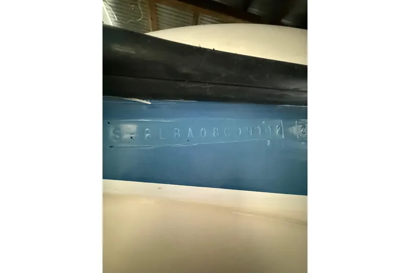Slide: The Image of Close-up of 2012 Bayliner 235 Bowrider hull identification number. - 51