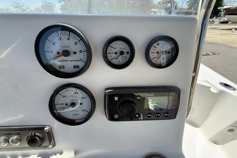 Slide: The Image of Dashboard of 2021 Tidewater 1910 Bay Max boat with Yamaha gauges and Fusion stereo. - 15