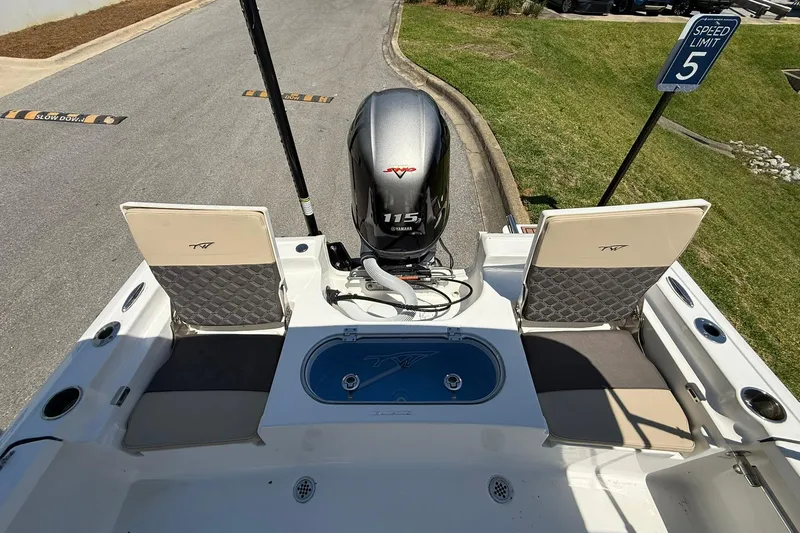 Slide: The Image of 2021 Tidewater 1910 Bay Max boat with Yamaha 115 engine, docked near speed limit sign. - 19