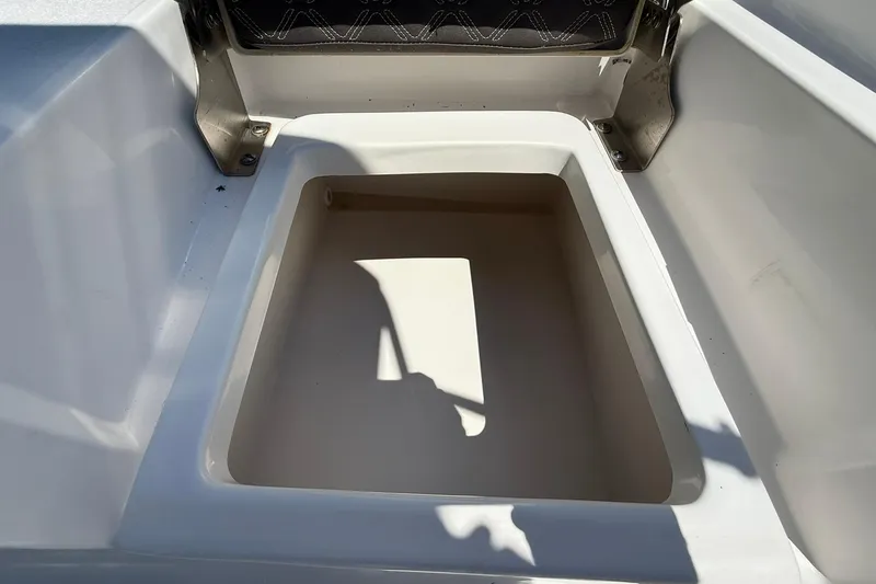 Slide: The Image of Storage compartment in 2021 Tidewater 1910 Bay Max boat, featuring a clean, spacious interior. - 20