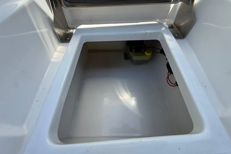 Slide: The Image of Storage compartment of 2021 Tidewater 1910 Bay Max boat, featuring clean interior. - 21
