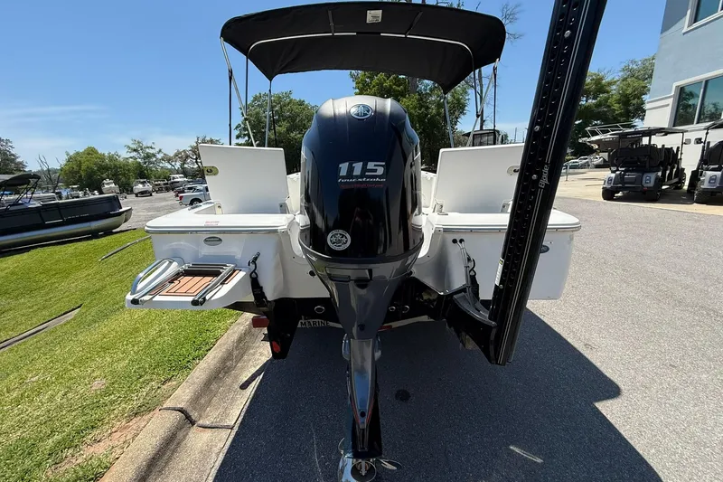 Slide: The Image of 2021 Tidewater 1910 Bay Max boat with 115 horsepower engine, parked outdoors. - 3