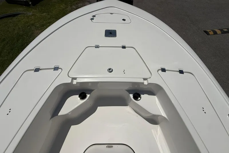 Slide: The Image of 2021 Tidewater 1910 Bay Max boat deck with storage compartments and sleek design. - 4