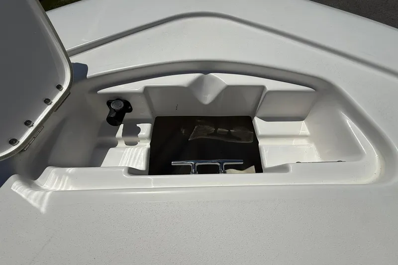 Slide: The Image of Open storage compartment on 2021 Tidewater 1910 Bay Max boat. - 5