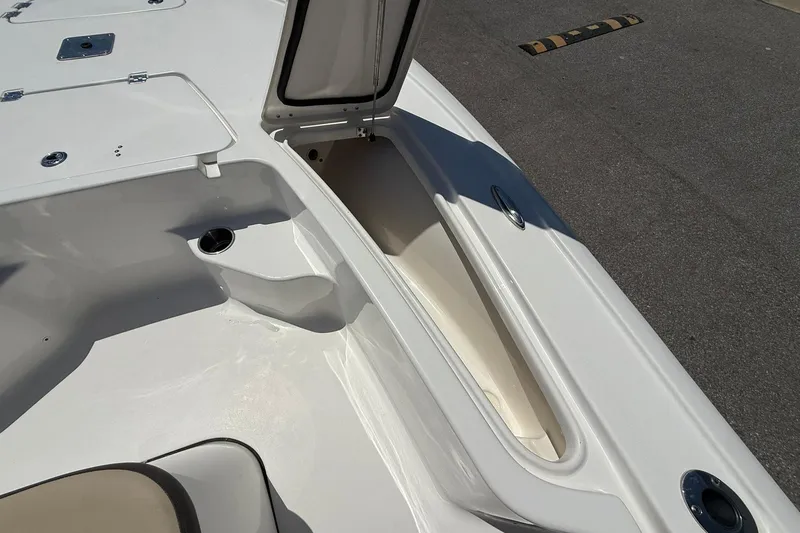 Slide: The Image of 2021 Tidewater 1910 Bay Max boat interior with open storage compartment. - 8