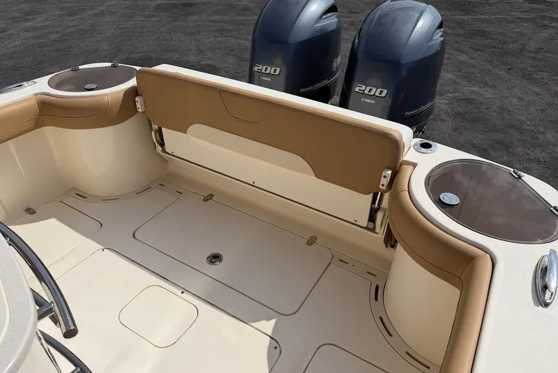 Slide: The Image of 2019 Scout 275 LXF boat interior with twin Yamaha 200 engines. - 25