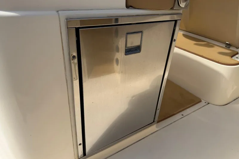 Slide: The Image of Stainless steel compartment on 2019 Scout 275 LXF boat interior. - 28