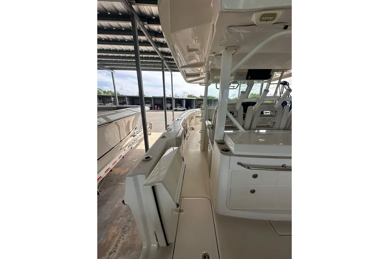 Slide: The Image of 2019 Boston Whaler 380 Outrage boat interior, showcasing sleek design and spacious layout. - 6