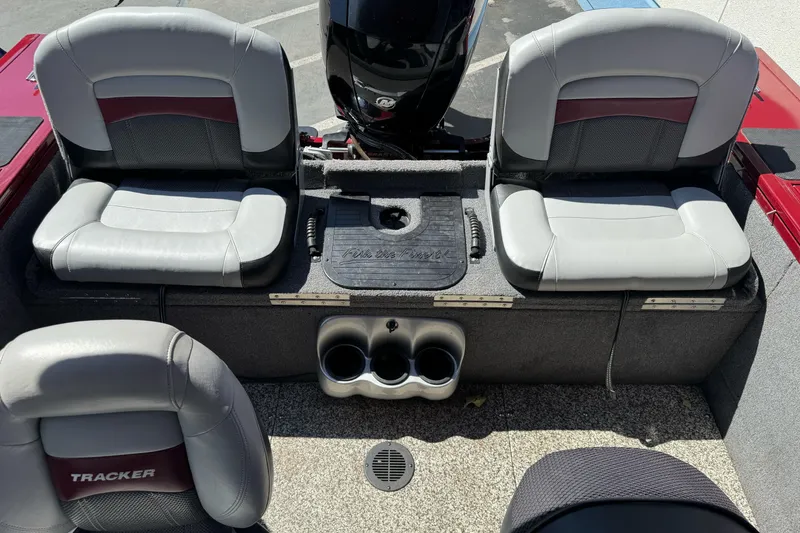 Slide: The Image of 2015 Tracker Targa V-18 Combo boat interior with seating and motor. - 20