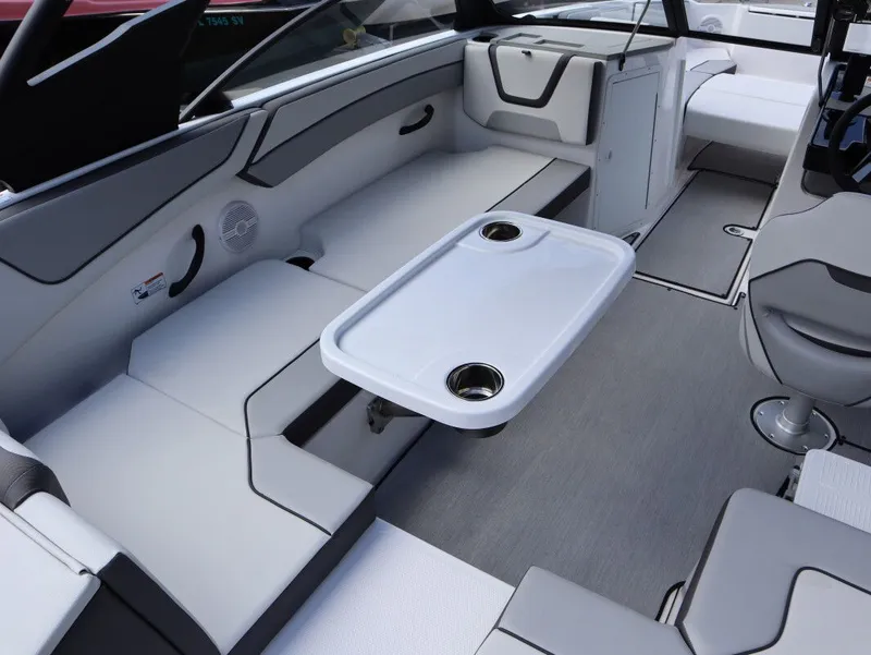 Slide: The Image of Interior of 2025 Yamaha Boats AR220 with seating and table. - 10