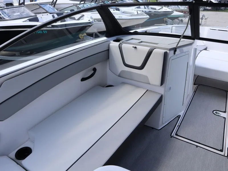 Slide: The Image of Interior of 2025 Yamaha Boats AR220 with gray upholstery. - 12