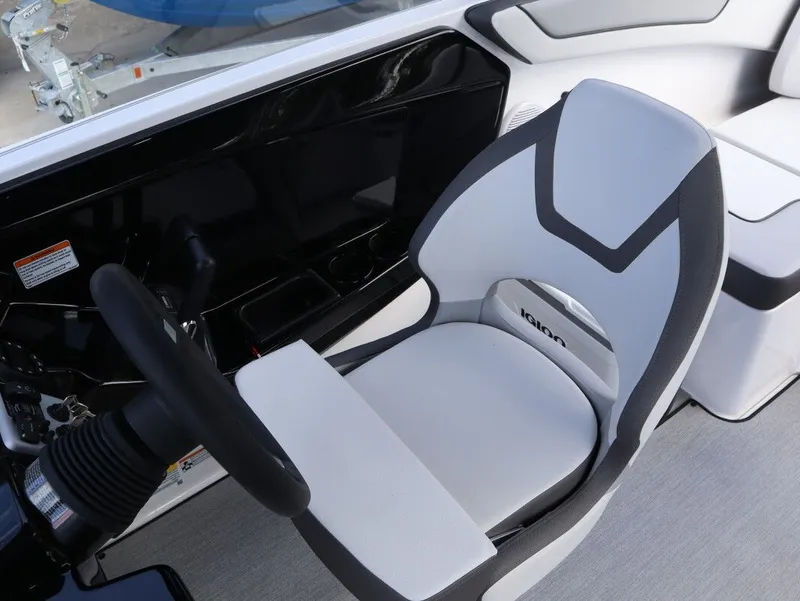 Slide: The Image of Interior of 2025 Yamaha Boats AR220 with modern helm station. - 15