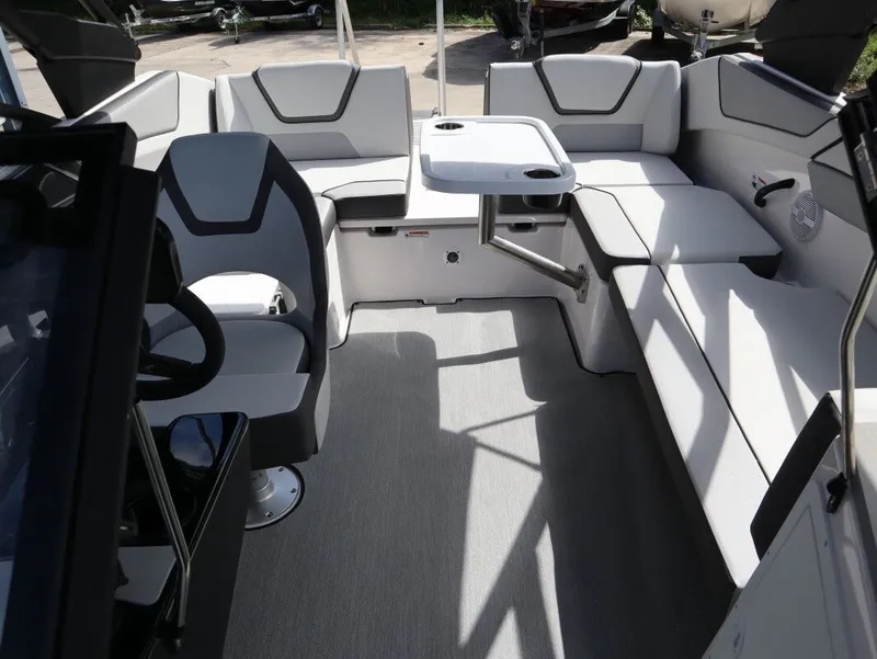 Slide: The Image of Interior of 2025 Yamaha Boats AR220 with seating and table. - 16