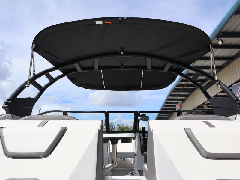 Slide: The Image of Yamaha Boats AR220 2025 with black sunshade, modern design. - 4