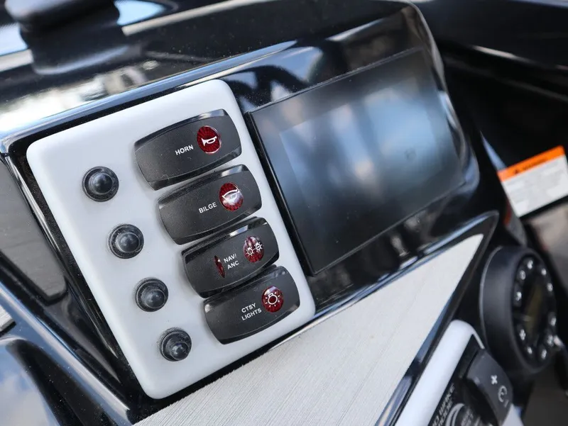 Slide: The Image of Yamaha AR220 2025 boat console with switches and display. - 5