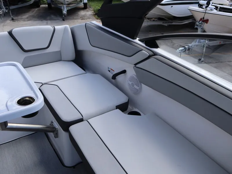 Slide: The Image of Interior of 2025 Yamaha Boats AR220 with gray upholstery. - 8