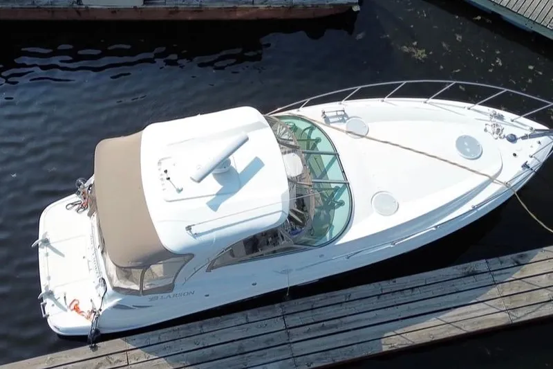 Slide: The Image of 2007 Larson Cabrio 350 boat docked at marina, aerial view. - 6
