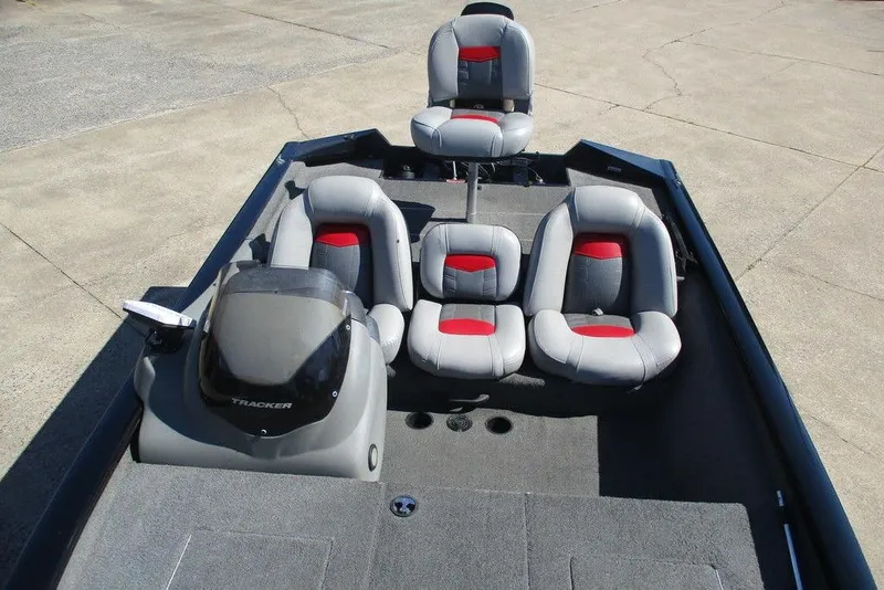 Slide: The Image of 2017 Tracker Pro Team 175 TXW boat interior with gray and red seating. - 5