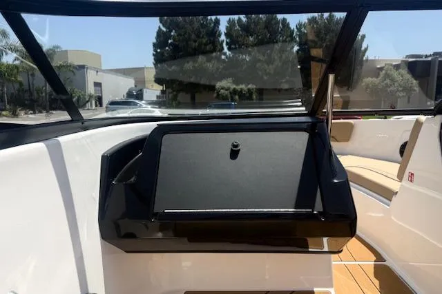 Slide: The Image of 2026 Bayliner V20i boat interior with sleek dashboard and modern design. - 15