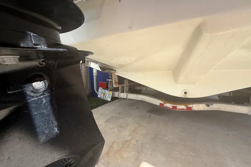 Slide: The Image of 1996 Grady-White Sailfish 272 boat underside and trailer detail. - 119
