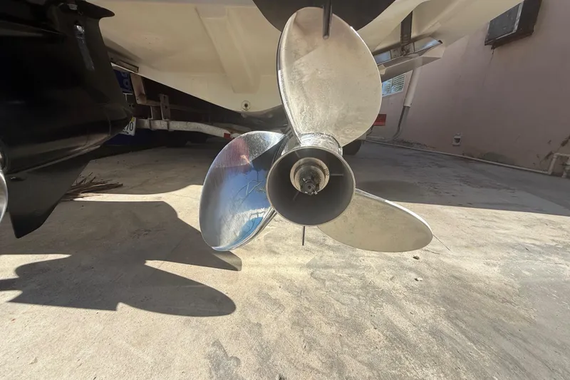 Slide: The Image of Close-up of a 1996 Grady-White Sailfish 272 boat propeller on a trailer. - 124