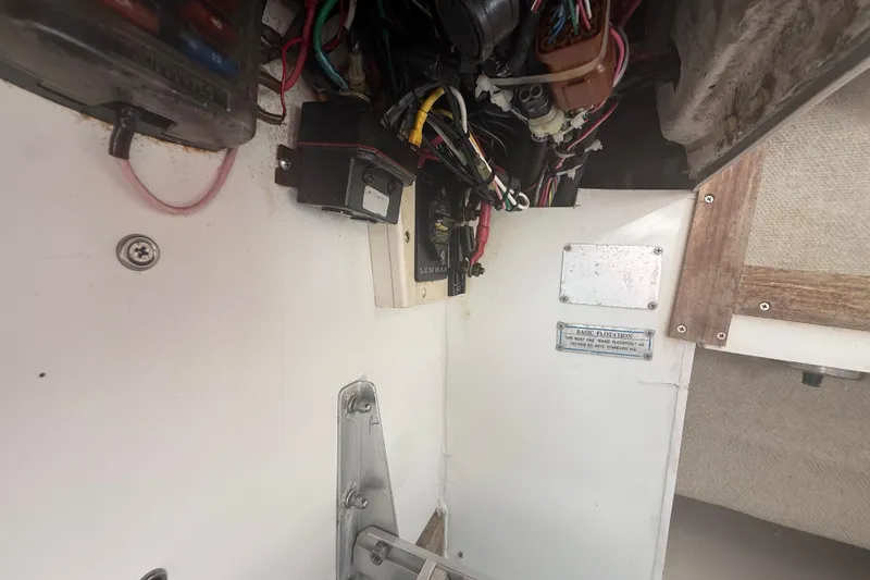 Slide: The Image of Electrical wiring and components inside a 1996 Grady-White Sailfish 272 boat. - 128