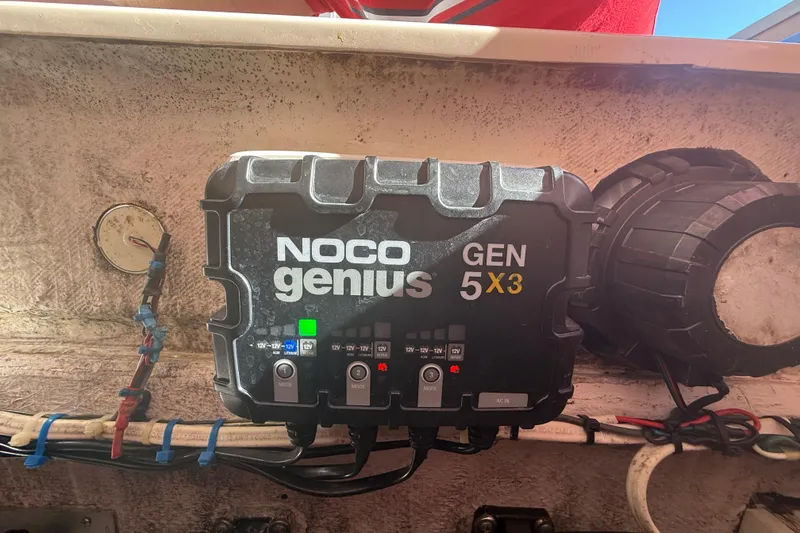 Slide: The Image of NOCO Genius GEN 5X3 charger installed on 1996 Grady-White Sailfish 272 boat. - 133