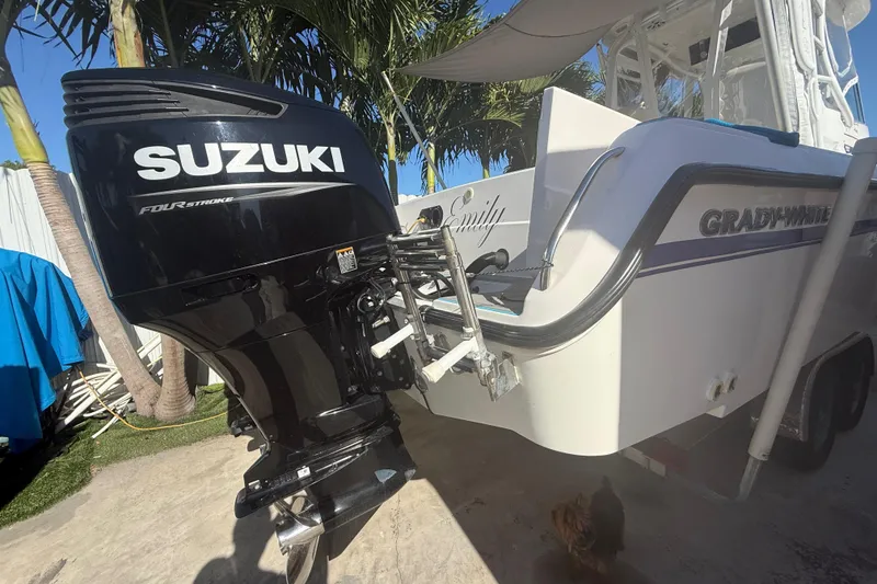 Slide: The Image of 1996 Grady-White Sailfish 272 boat with Suzuki four-stroke outboard motor. - 17