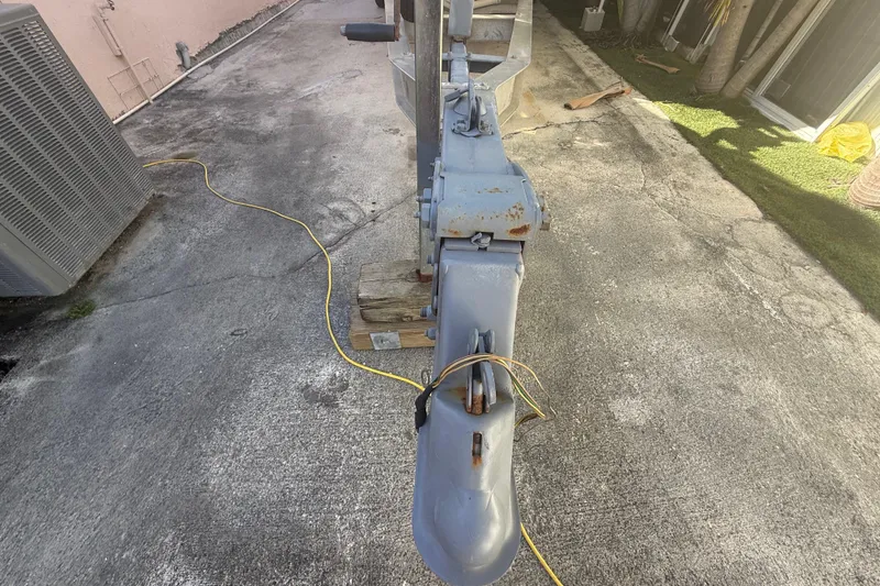 Slide: The Image of Rusty boat trailer hitch on concrete, Grady-White Sailfish 272, 1996 model. - 35