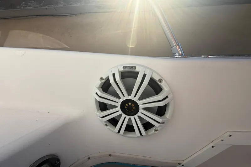 Slide: The Image of Speaker on 1996 Grady-White Sailfish 272 boat, sunlight reflecting on chrome railing. - 88