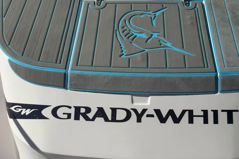 Slide: The Image of 1996 Grady-White Sailfish 272 boat deck with logo and branding. - 97